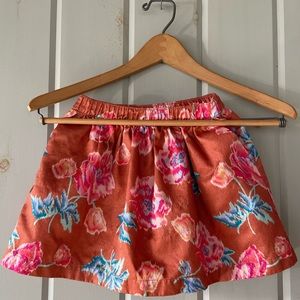 Gymboree girls skirt, metallic rust fabric with colorful floral pattern.  Size 4